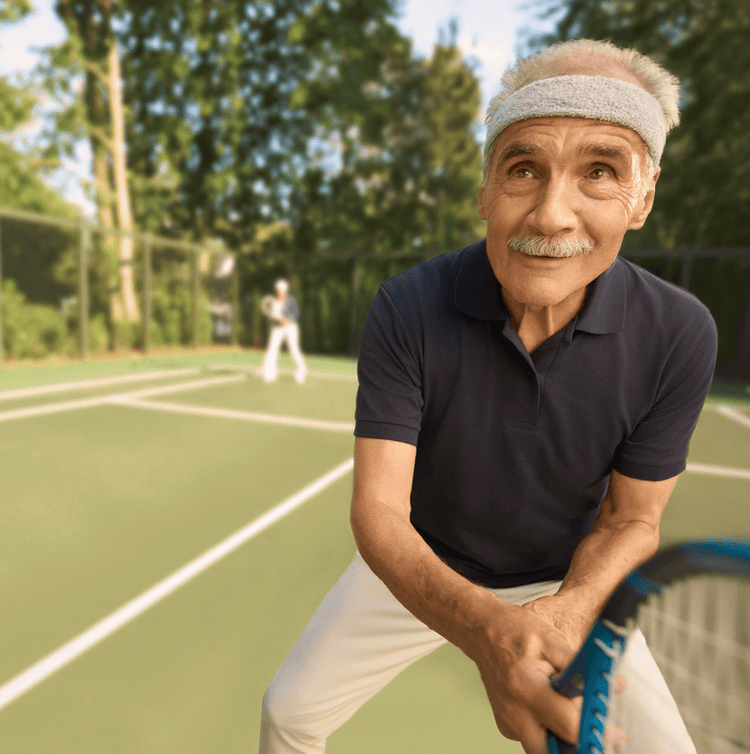 Older adult playing tennis